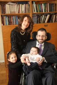 The couple with two of their children. The younger child seen above was born soon after the accident.  Photo: Issie Scarowsky