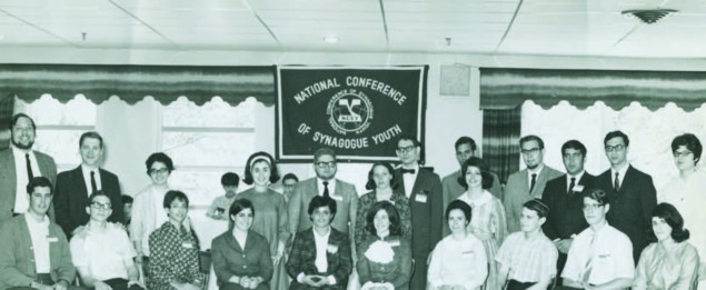 Ben Zakkai induction at NCSY’s 1968 National Convention. Standing, from left: (Rabbi) Menachem Gopin, (Dr.) David Luchins, Anne S. Weinrauch (Merzel), Elaine Goldstein (Strajcher), (Rabbi) Shalom Strajcher, Vivian Osdoby (Luchins), Alex Gross, Nahum Twersky, Toni Feltcher (Chernofsky), Yaakov Kornreich, Jack M. Gross, (Rabbi Yehuda) Jerry Cheplowitz, Devorah Abrams (Gasner). Seated, from left: (Rabbi) Jeffrey Feinstein, (Dr.) David L. Hurwitz, Debby Klaff (Dan), Ellen Kurzer (Federman), Marilyn Shaeffer (Arsham), Roberta (Rivka) Minkoff (Leff), Arlene Ginsburg (Gross), (Rabbi) Joshua Freilich, Ezra Lightman (z”l), (Rivka) Reggie Singer (Powers).