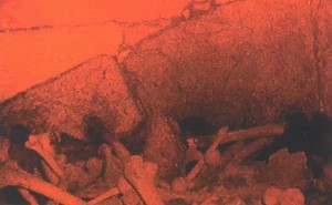 (Plate #2) View inside the cavern.  The stones arching upward are built onto the original Shushan Gateway.