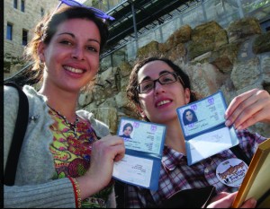 Two French olim proudly showing their new Israeli ID cards.  Photos courtesy of the Jewish Agency for Israel