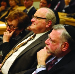 From right: Allen I. Fagin, OU President Marty Nachimson and his wife, Liz, listening to Rabbi Weinberger.  Photos: Lewis Groner